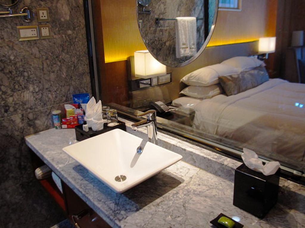Guangzhou Manguo Internation Hotel Rum bild