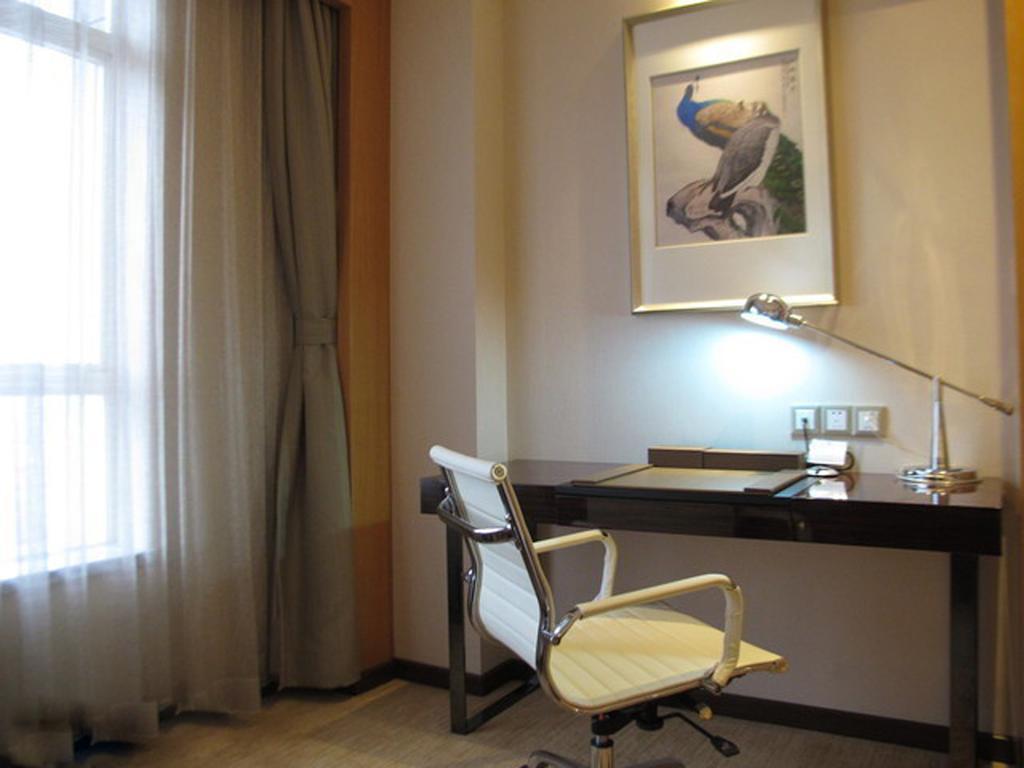 Guangzhou Manguo Internation Hotel Rum bild